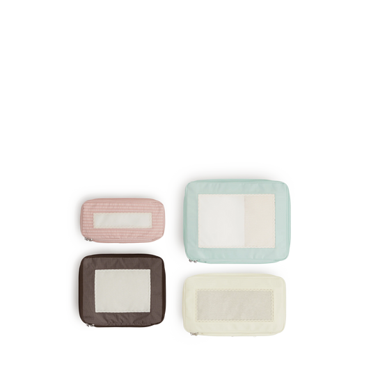 Monos × Reformation Compressible Packing Cubes